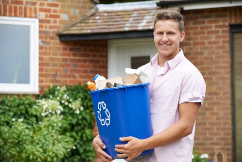 Professional team organizing items during house clearance in Purfleet