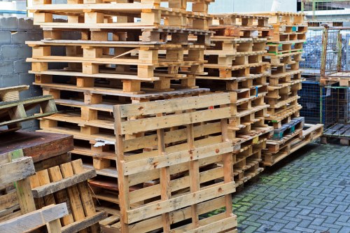 Electric low-carbon vans loading commercial recycling for transfer station